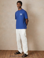 | Ché Cotton Palm-Print T-Shirt in Blue