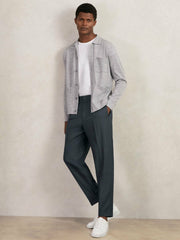 Relaxed-Fit Pleated Tapered Trousers in Steel Blue