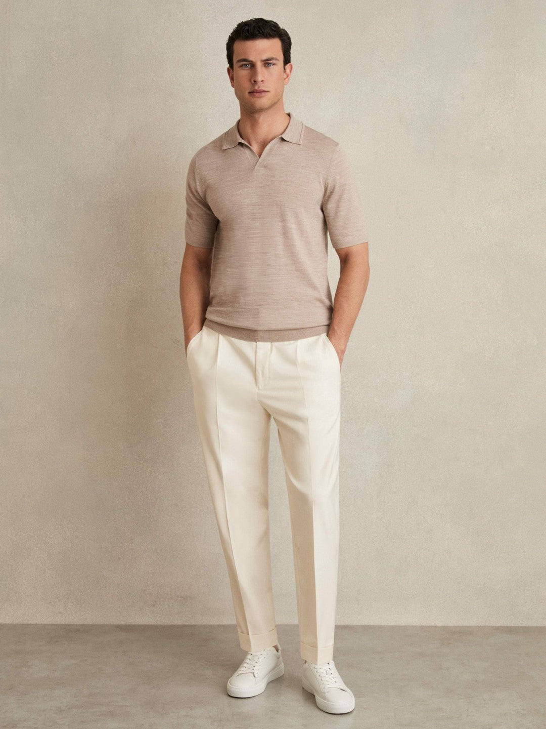 Relaxed-Fit Pleated Tapered Trousers in Ecru