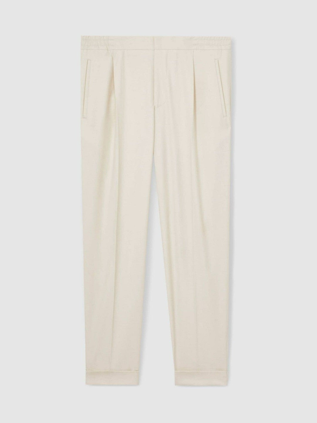 Relaxed-Fit Pleated Tapered Trousers in Ecru
