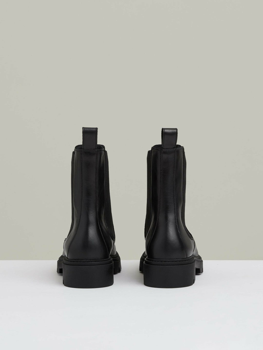 Leather Cleated Sole Chelsea Boots in Black