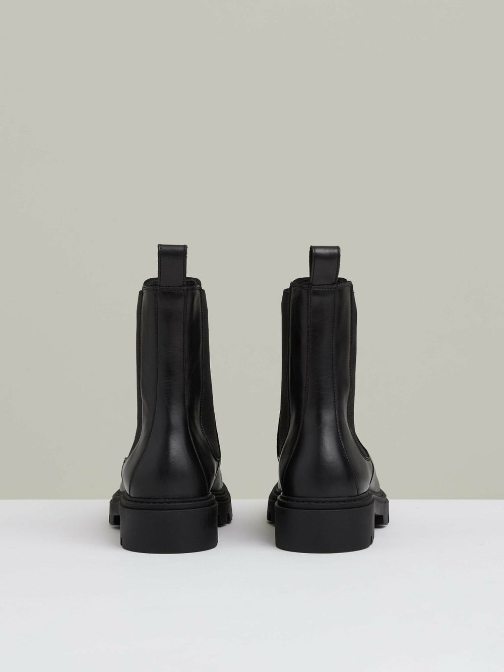 Leather Cleated Sole Chelsea Boots in Black