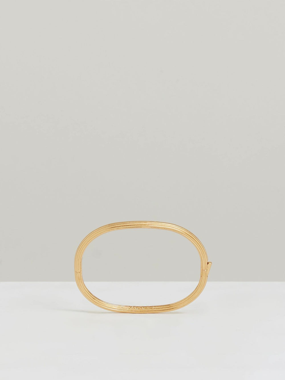 Contour Hinged Cuff in Gold Tone