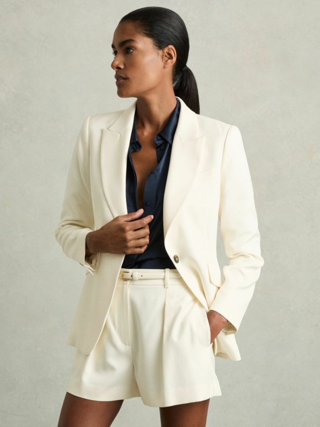 Single-Pleat Tailored Shorts in Cream