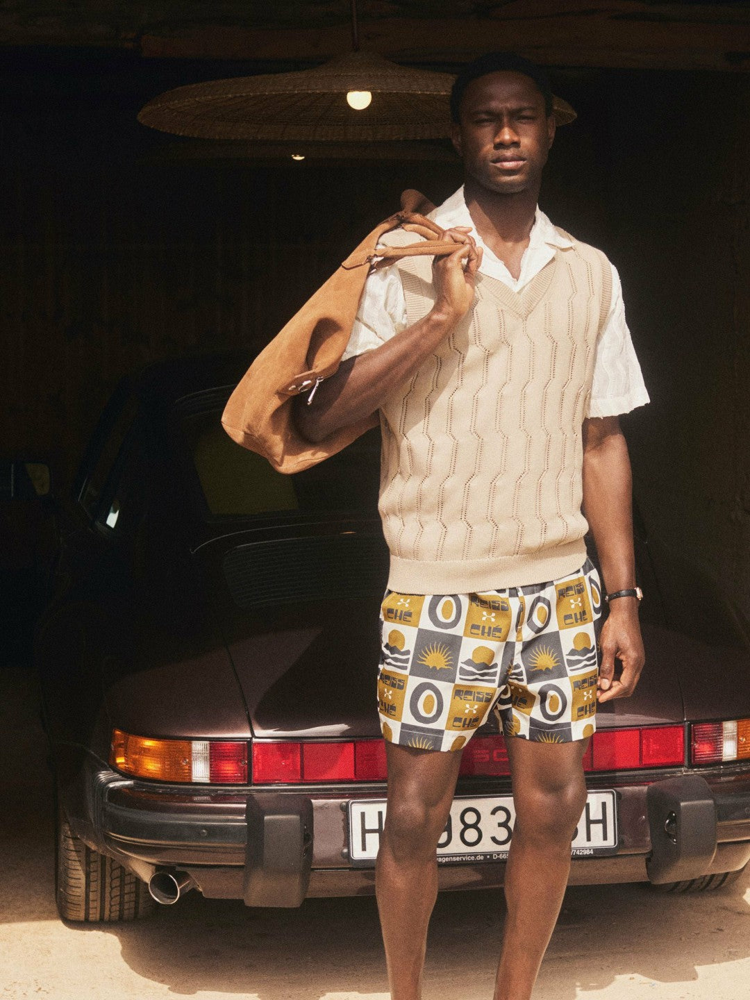 | Ché Sunset-Print Swim Shorts in Olive Green