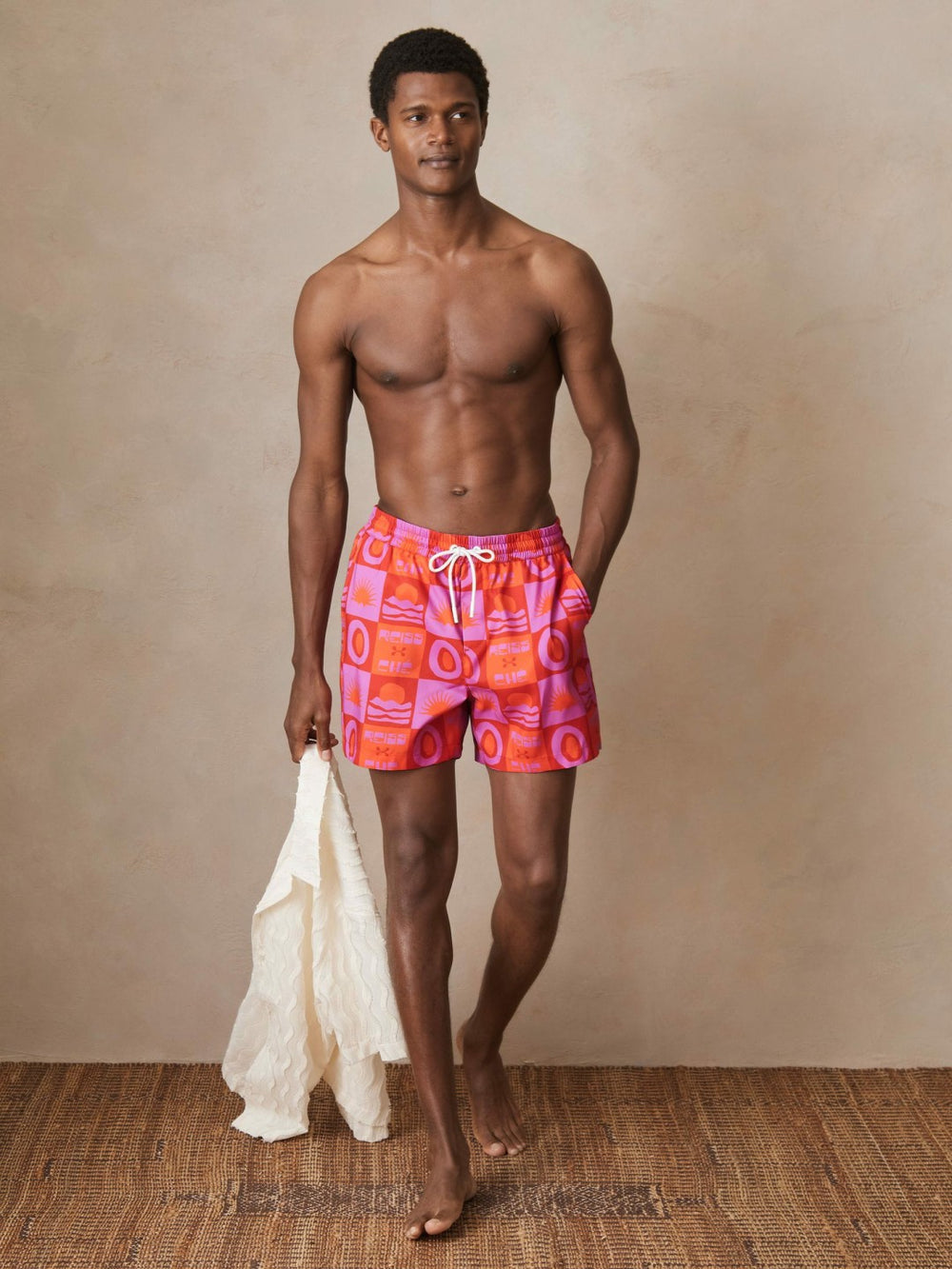 | Ché Sunset-Print Swim Shorts in Orange/Pink