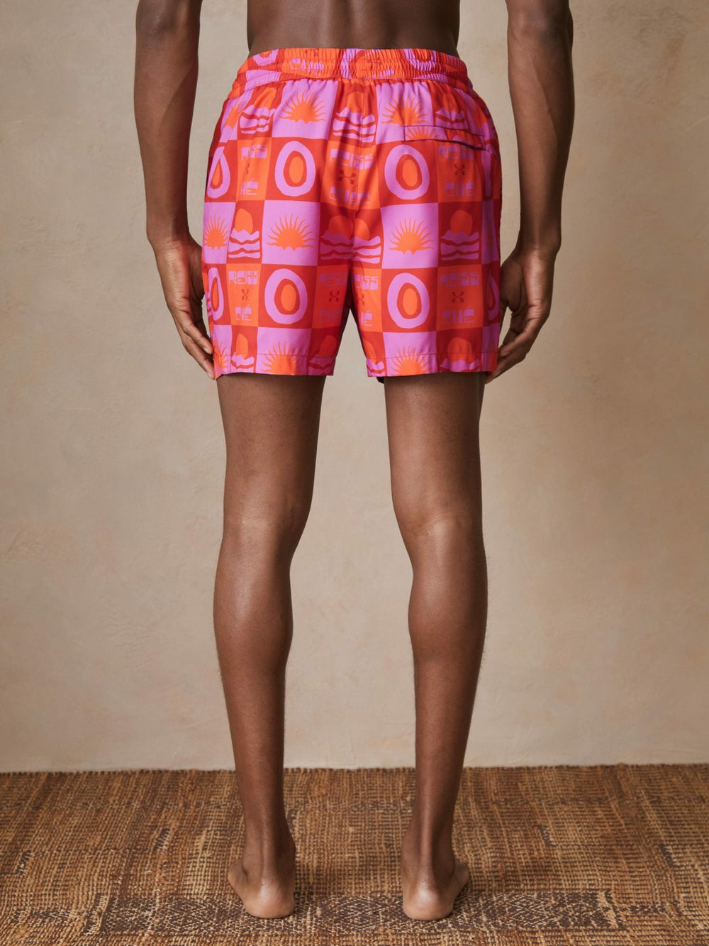 | Ché Sunset-Print Swim Shorts in Orange/Pink