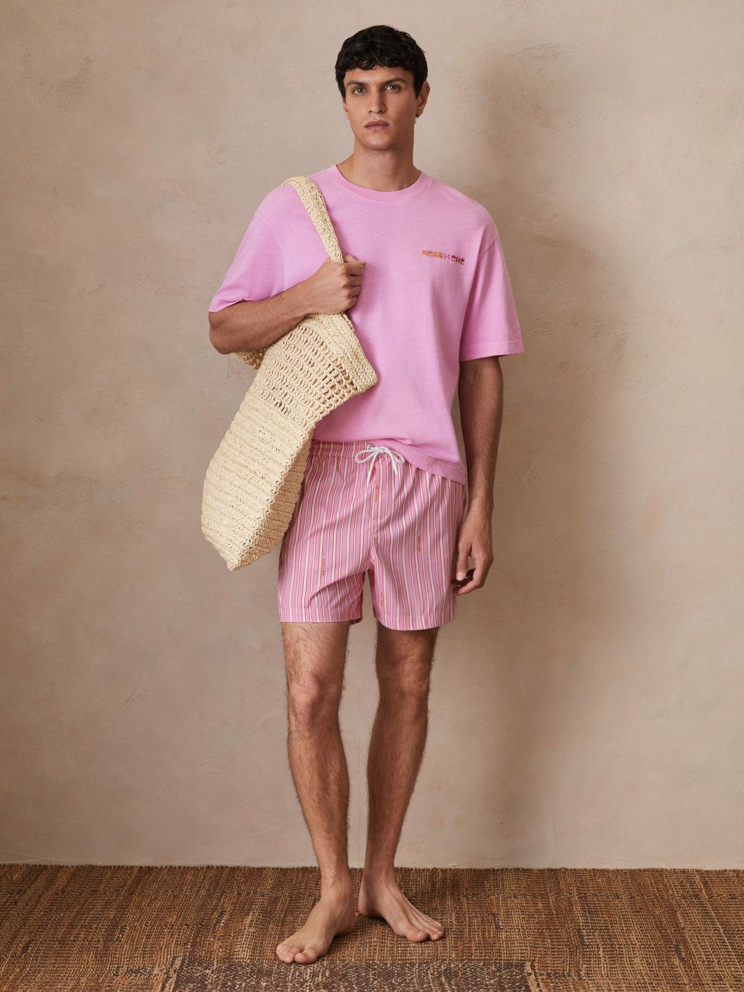 | Ché Stripe Swim Shorts in Pink/White