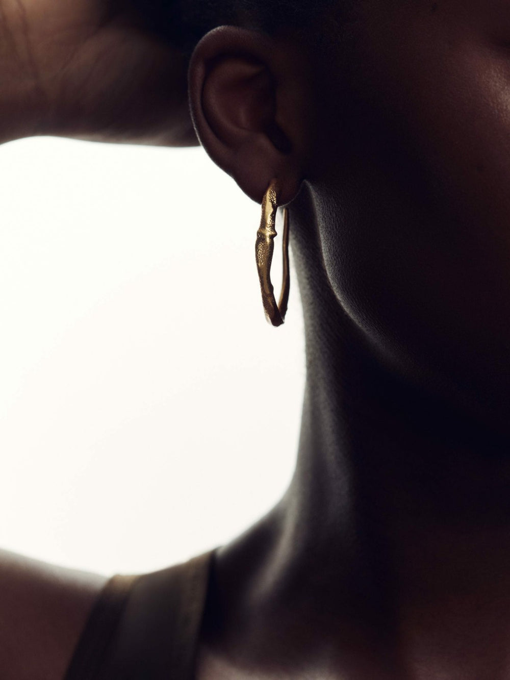 Molten Hoop Earrings in Gold Tone