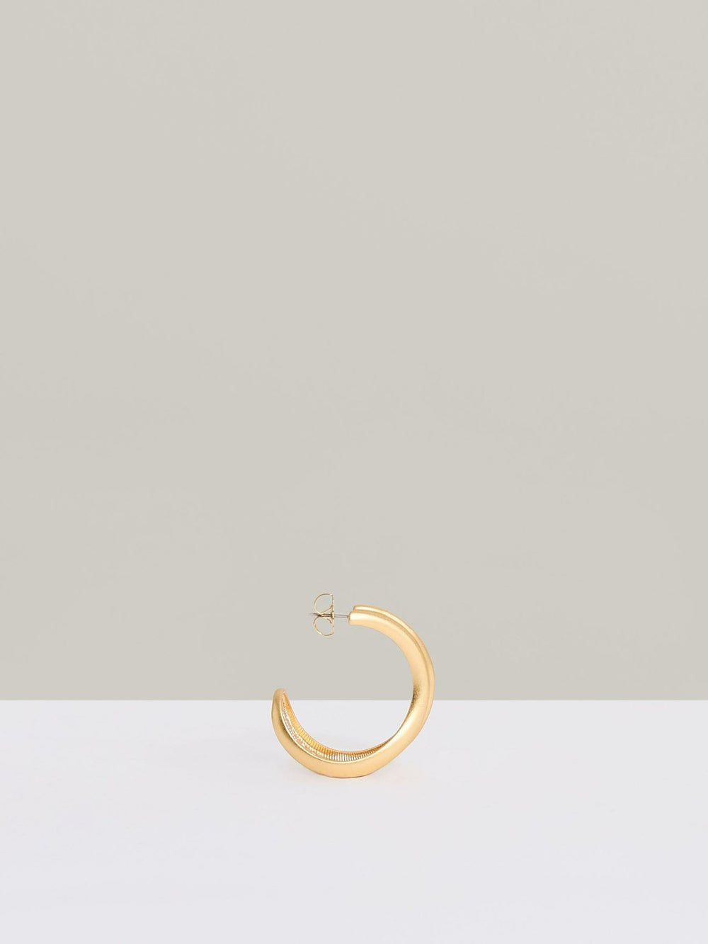 Fluid Hoop Earrings in Gold Tone