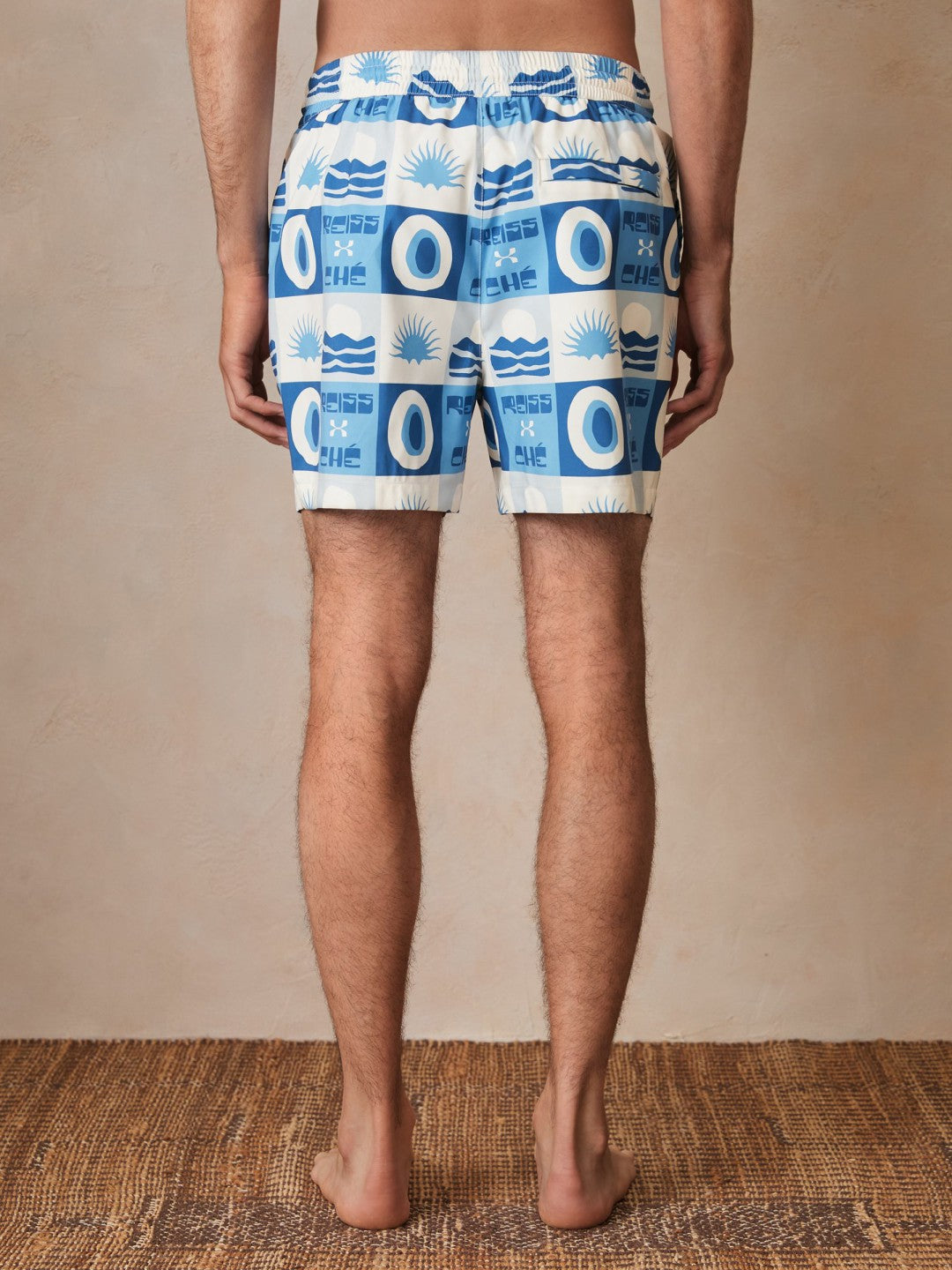 | Ché Sunset-Print Swim Shorts in Blue Multi