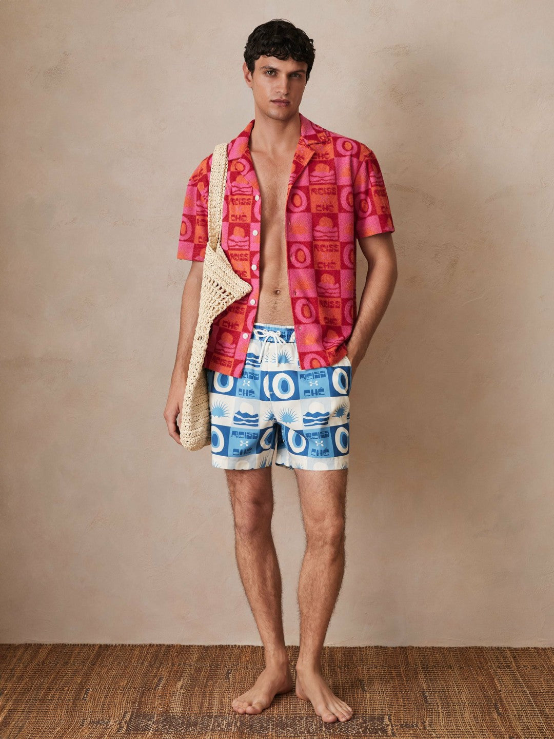 | Ché Sunset-Print Swim Shorts in Blue Multi