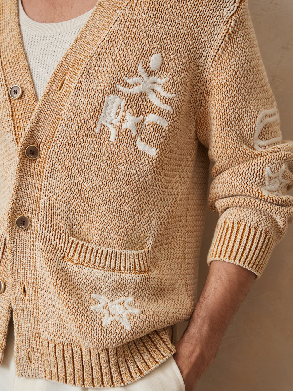 | Ché Motif-Embroidered Cardigan in Camel