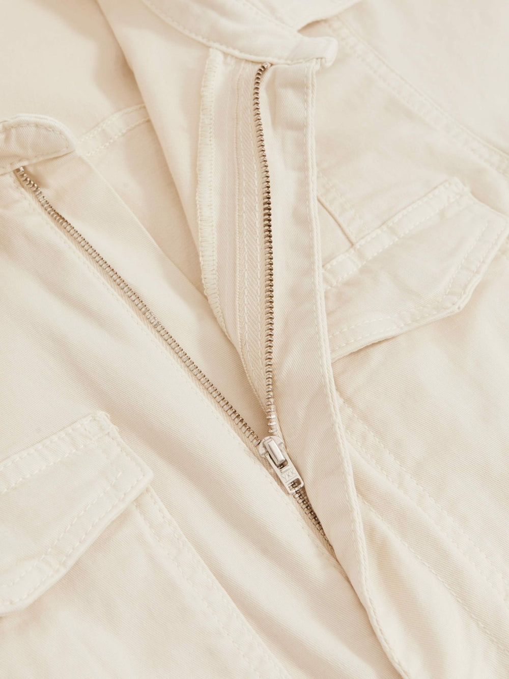 Good American Cotton Twill Jumpsuit with Stretch in Ecru