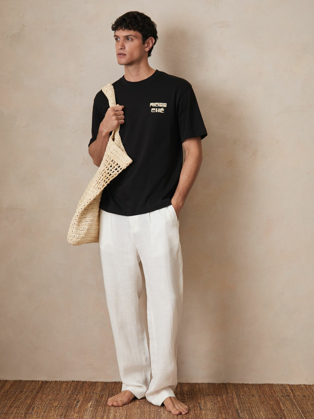 | Ché Cotton Palm-Print T-Shirt in Black