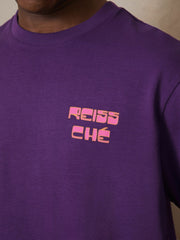 | Ché Cotton Palm-Print T-Shirt in Purple