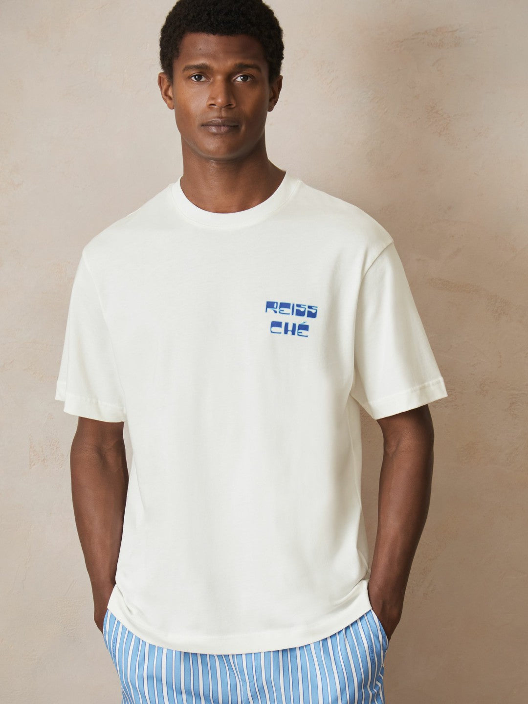 | Ché Cotton Palm-Print T-Shirt in White