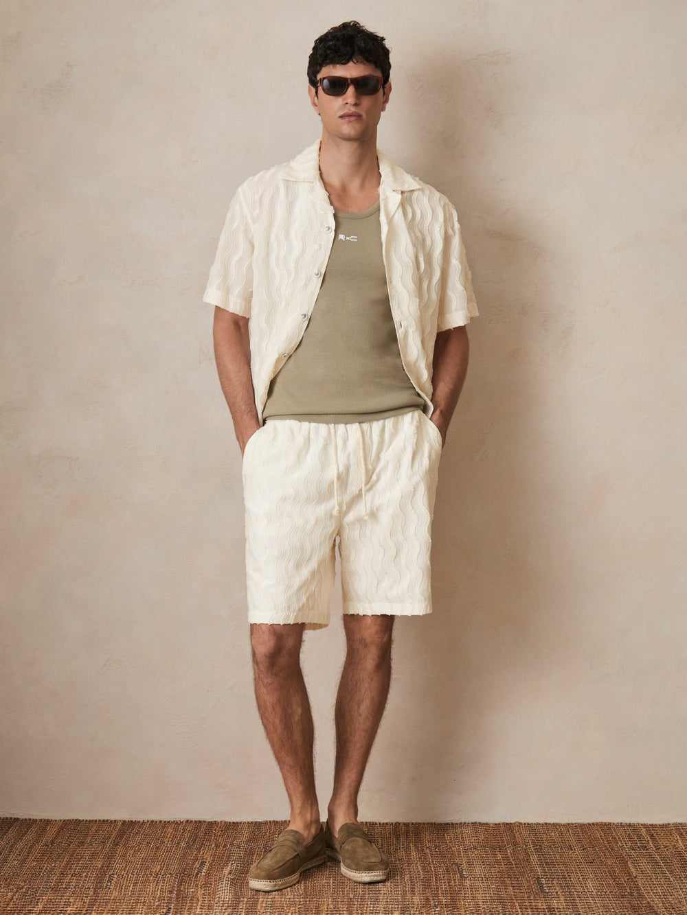 | Ché Fringed-Wave Shorts in Off White