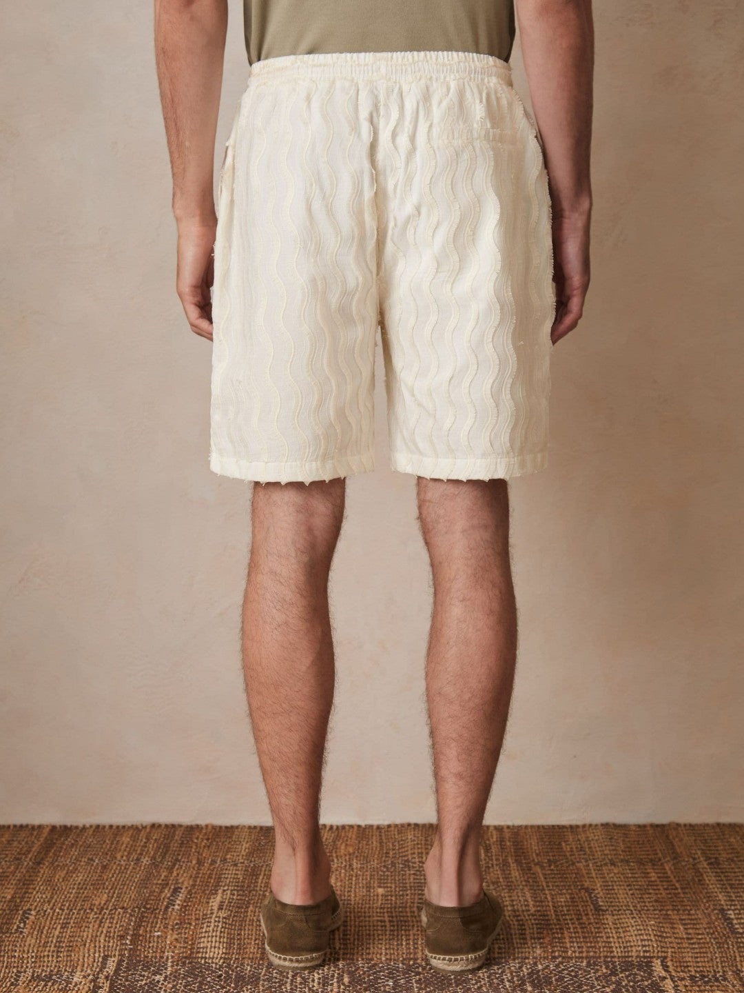 | Ché Fringed-Wave Shorts in Off White