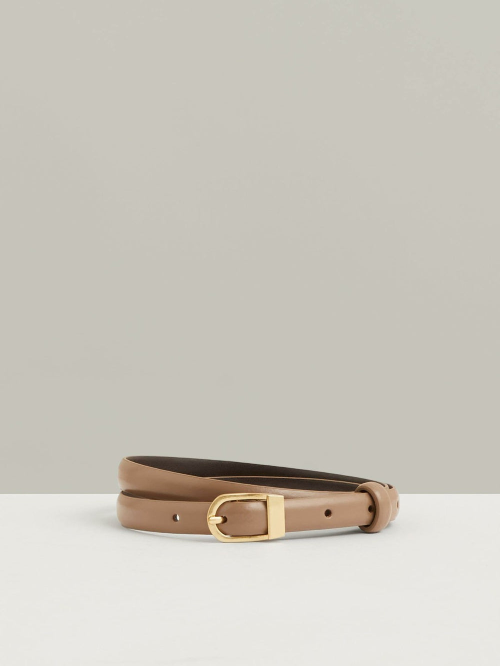 Leather Curved-Buckle Skinny Belt in Taupe