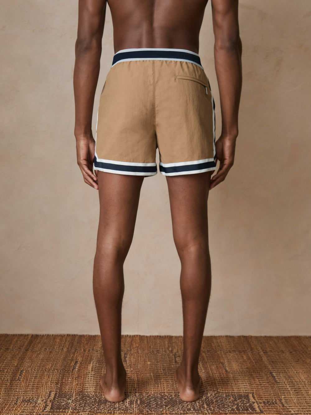 | Ché Stripe-Trim Swim Shorts in Camel