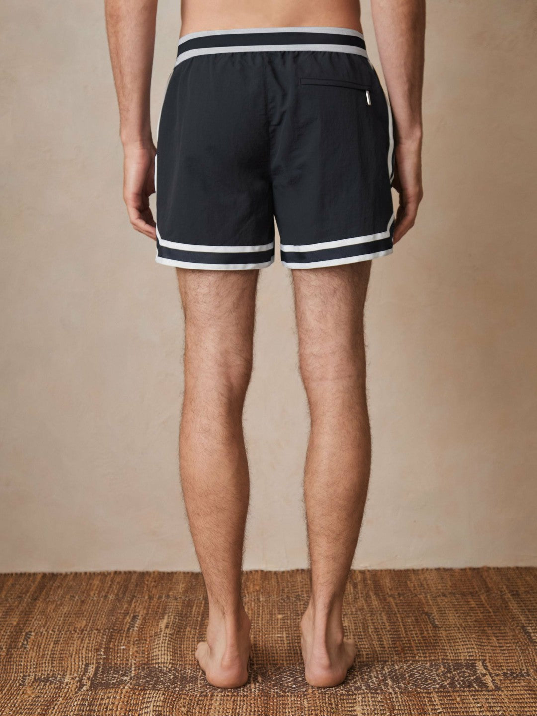 | Ché Stripe-Trim Swim Shorts in Navy