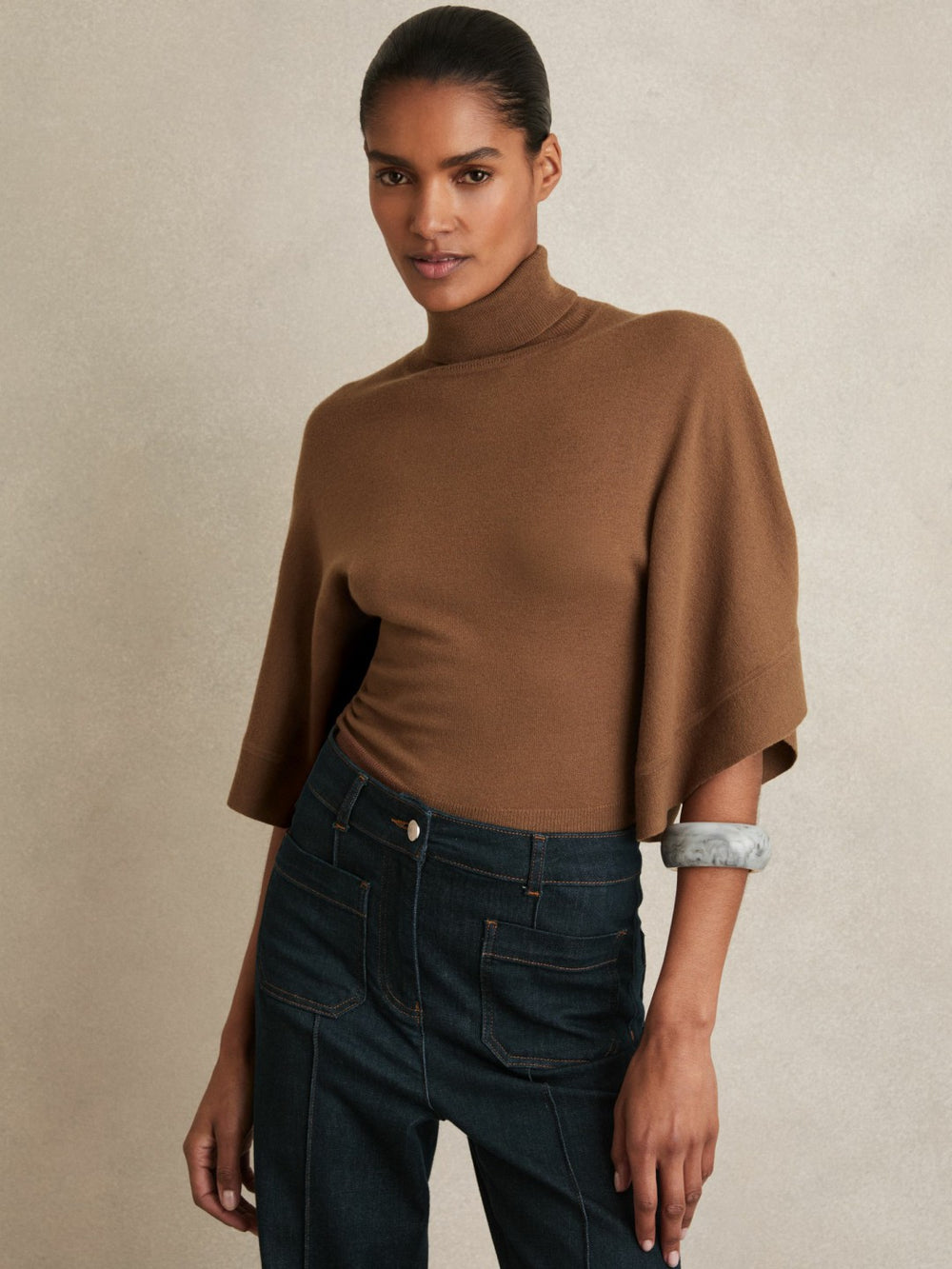 Merino Wool Batwing Roll-Neck Jumper in Tan