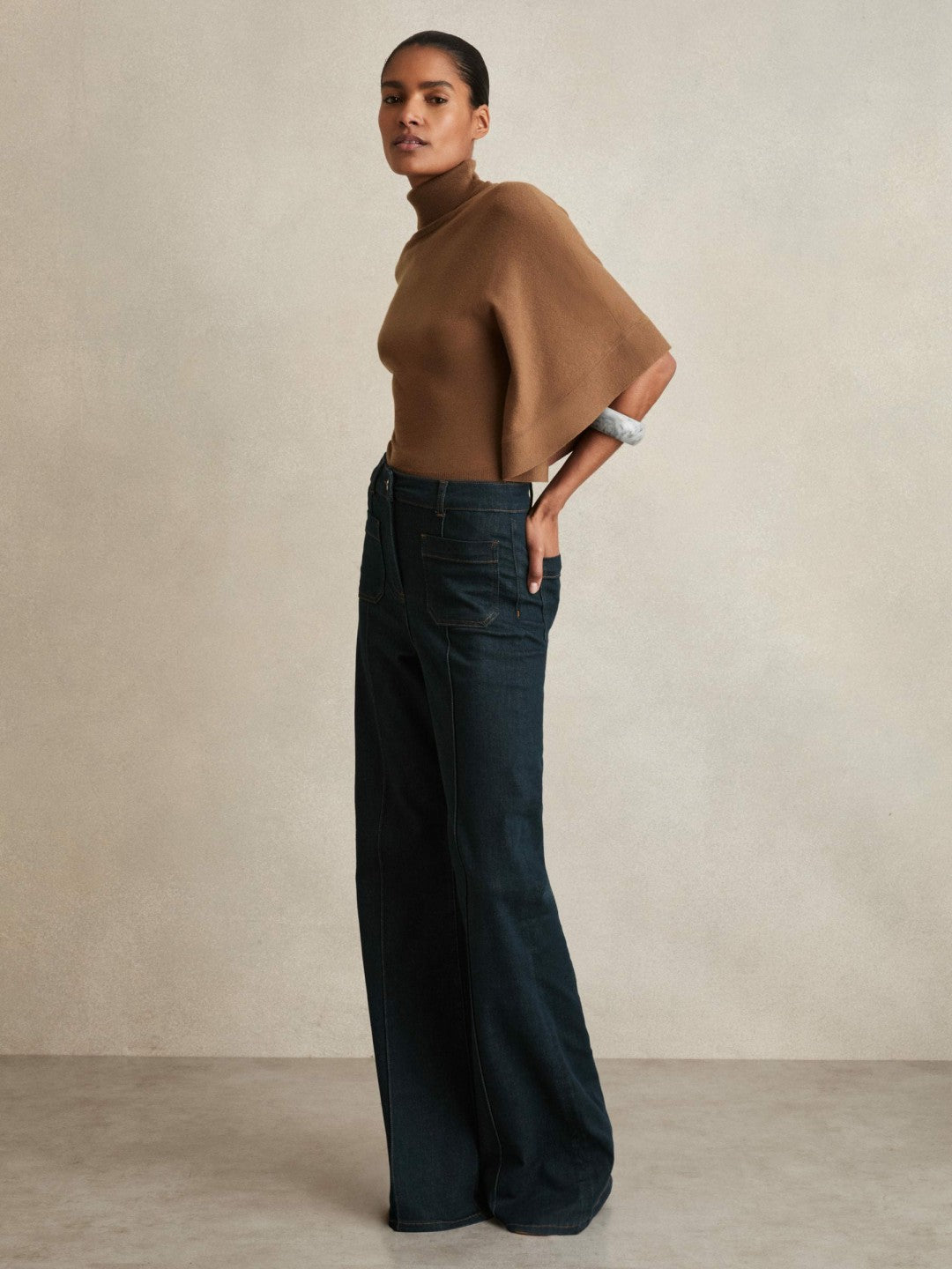 Merino Wool Batwing Roll-Neck Jumper in Tan