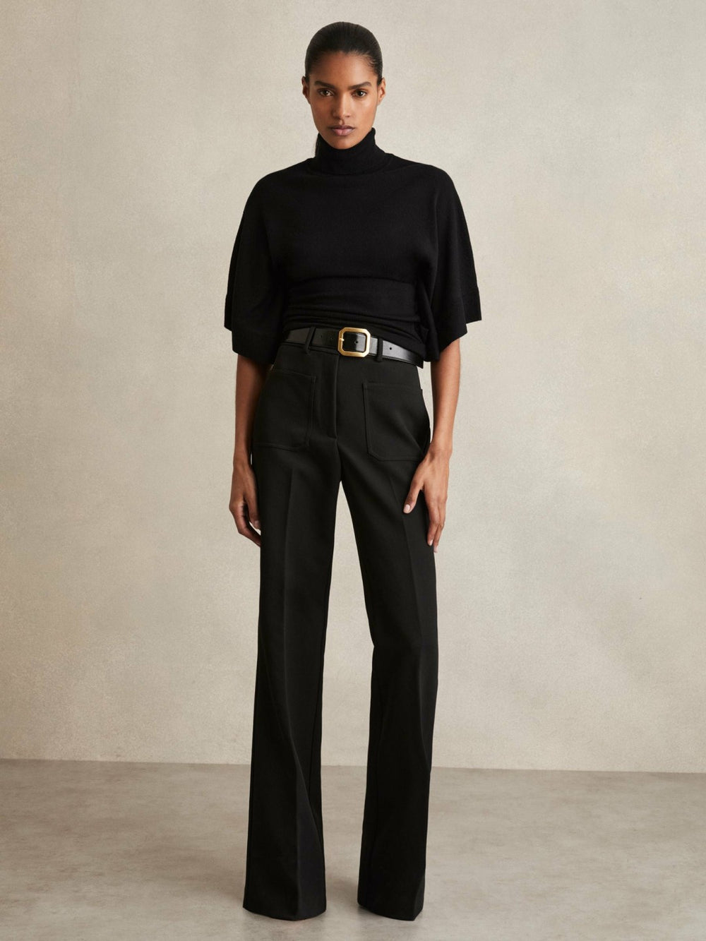Merino Wool Batwing Roll-Neck Jumper in Black