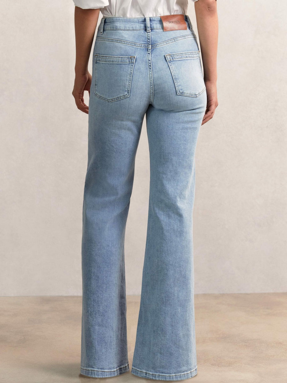Petite Mid-Rise Flared Jeans in Light Blue