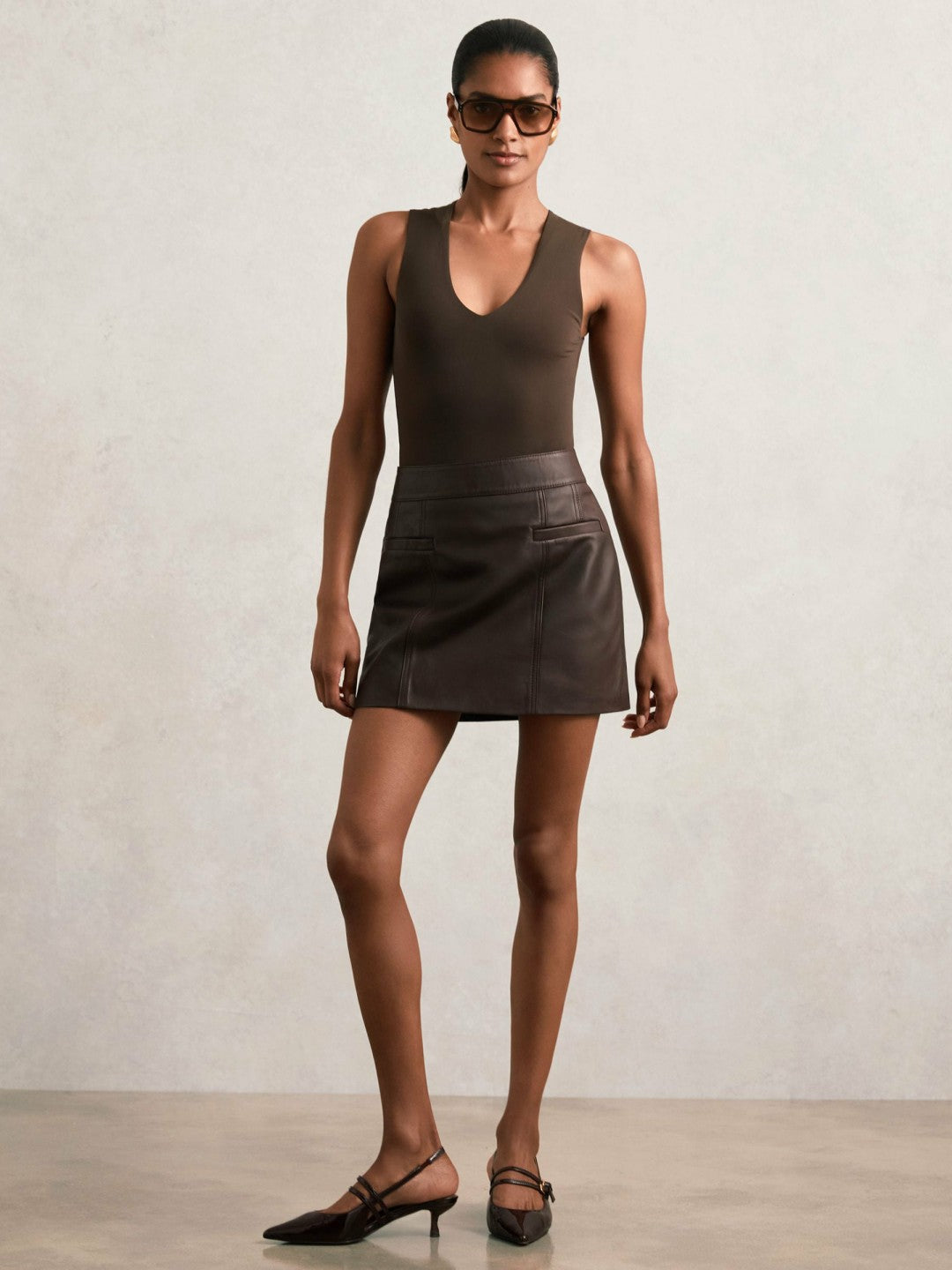 Leather Welt-Pocket Mini Skirt in Burgundy