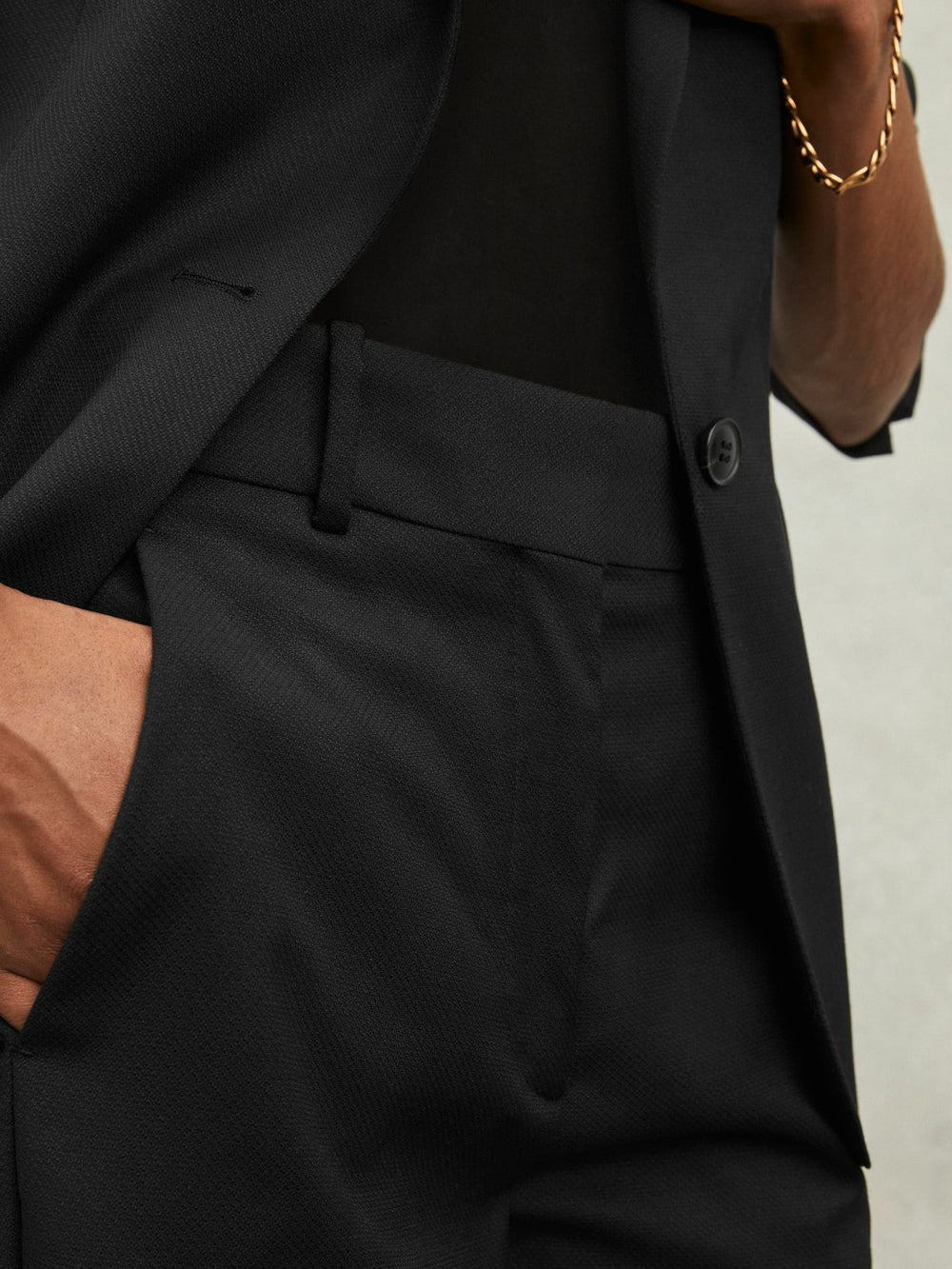 Wool-Blend Tailored Flared Suit Trousers in Black