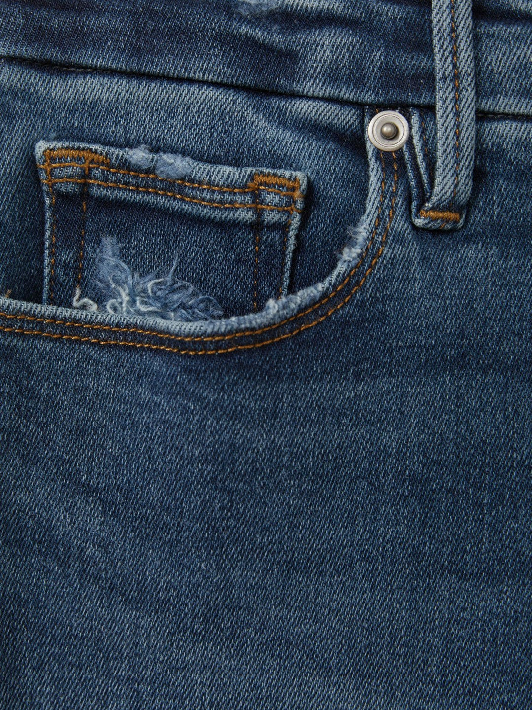 Good American Mid Rise Raw Hem Skinny Jeans in Indigo