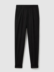 Relaxed-Fit Pleated Tapered Trousers in Black