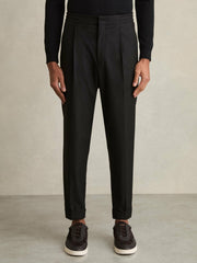 Relaxed-Fit Pleated Tapered Trousers in Black