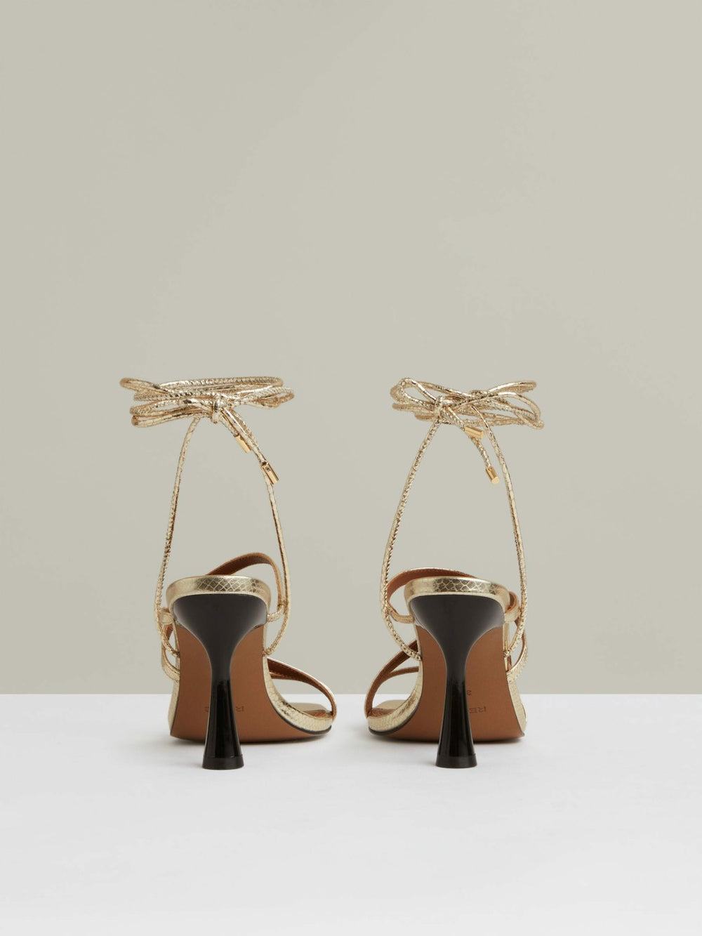 Leather Metallic Strappy Heeled Sandals in Gold