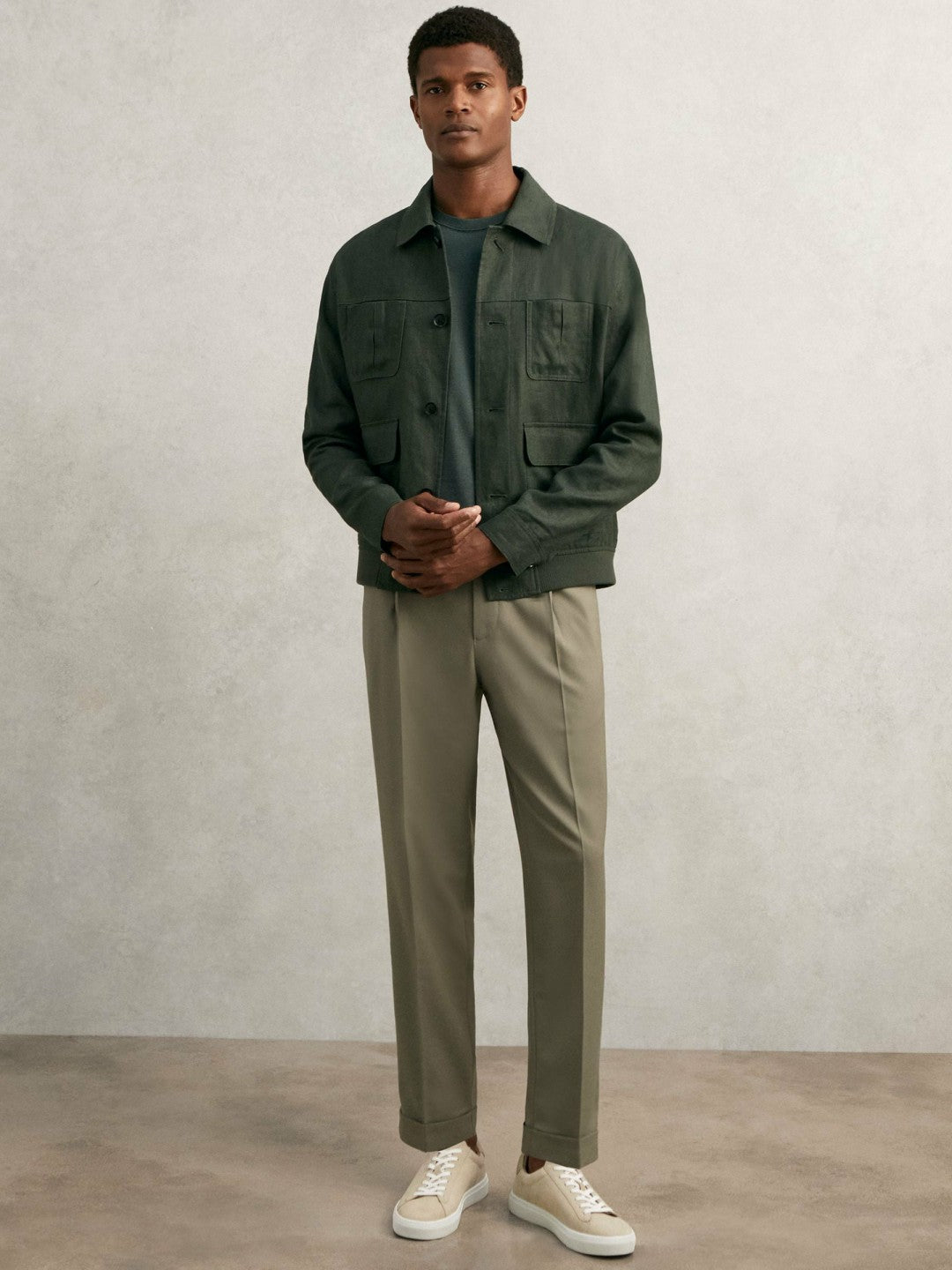 Relaxed-Fit Pleated Tapered Trousers in Sage
