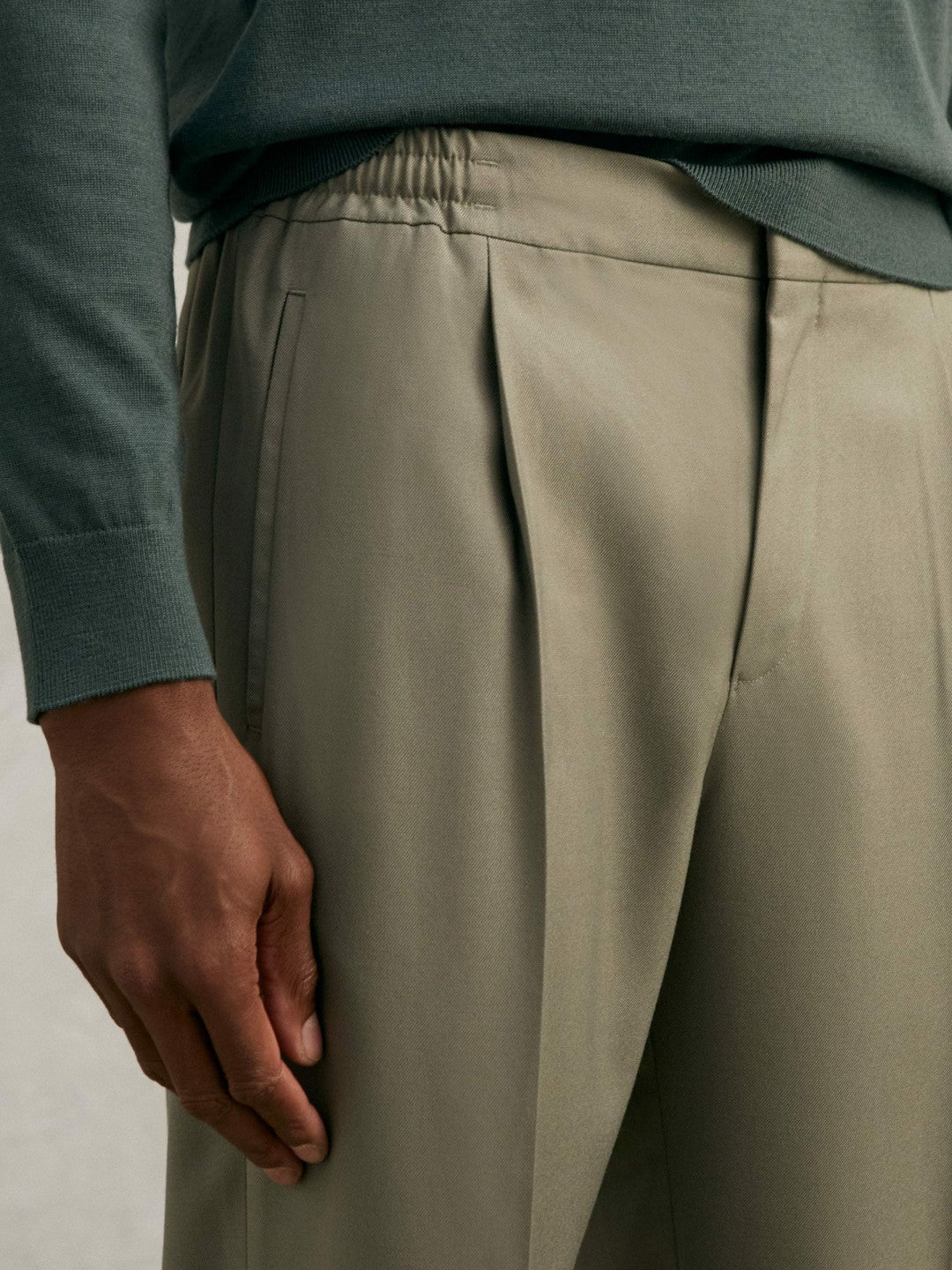 Relaxed-Fit Pleated Tapered Trousers in Sage
