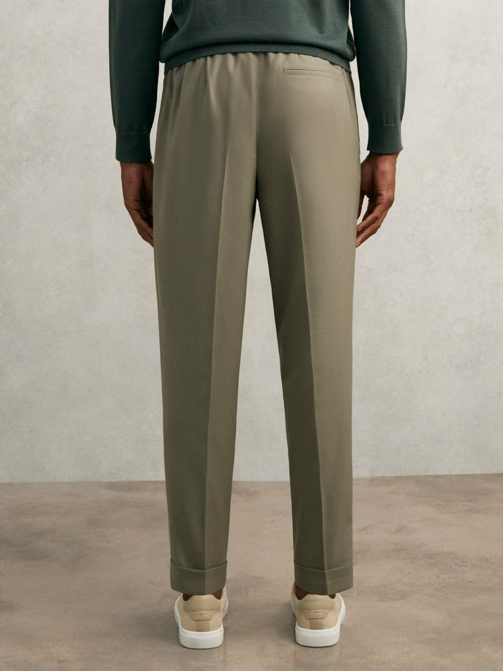 Relaxed-Fit Pleated Tapered Trousers in Sage