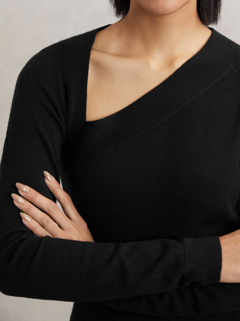 Wool-Blend Asymmetric Knit Top in Black