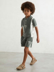 13-14 yrs Chenille Tipped Motor Cars Polo Shirt in Dark Sage Green/White